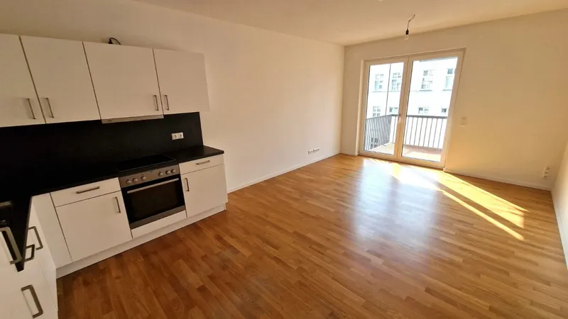 Neubauwohnung nahe Tierpark Dusch- und Wannenbad/Balkon/EBK/Fußbodenheizung — photo 1